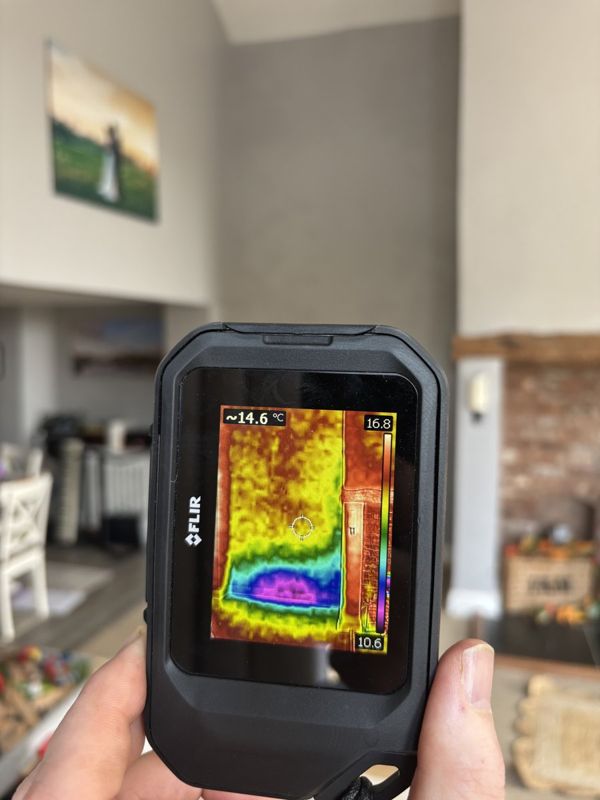 FLIR thermal imaging survey showing wall temperature differential