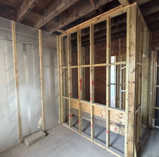 Studwork partition with fixing grounds ready for services