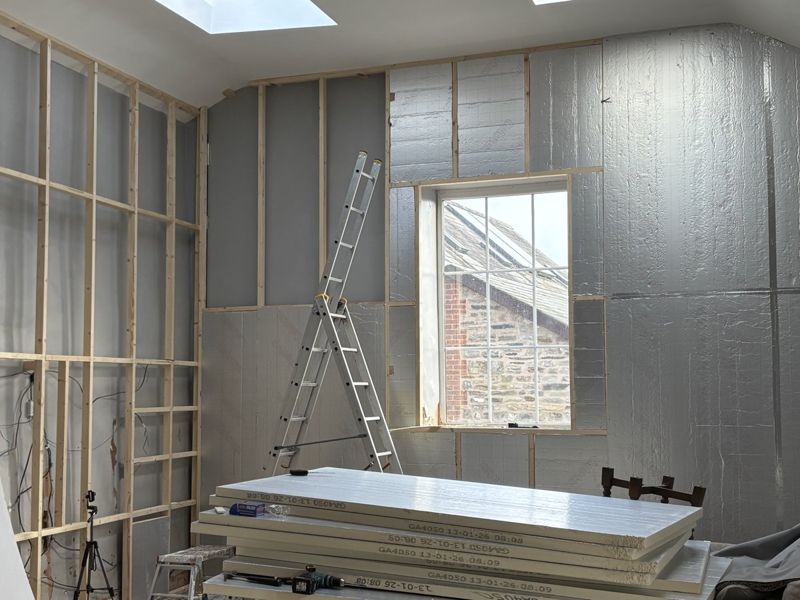 Insulation boards stacked and partially fitted